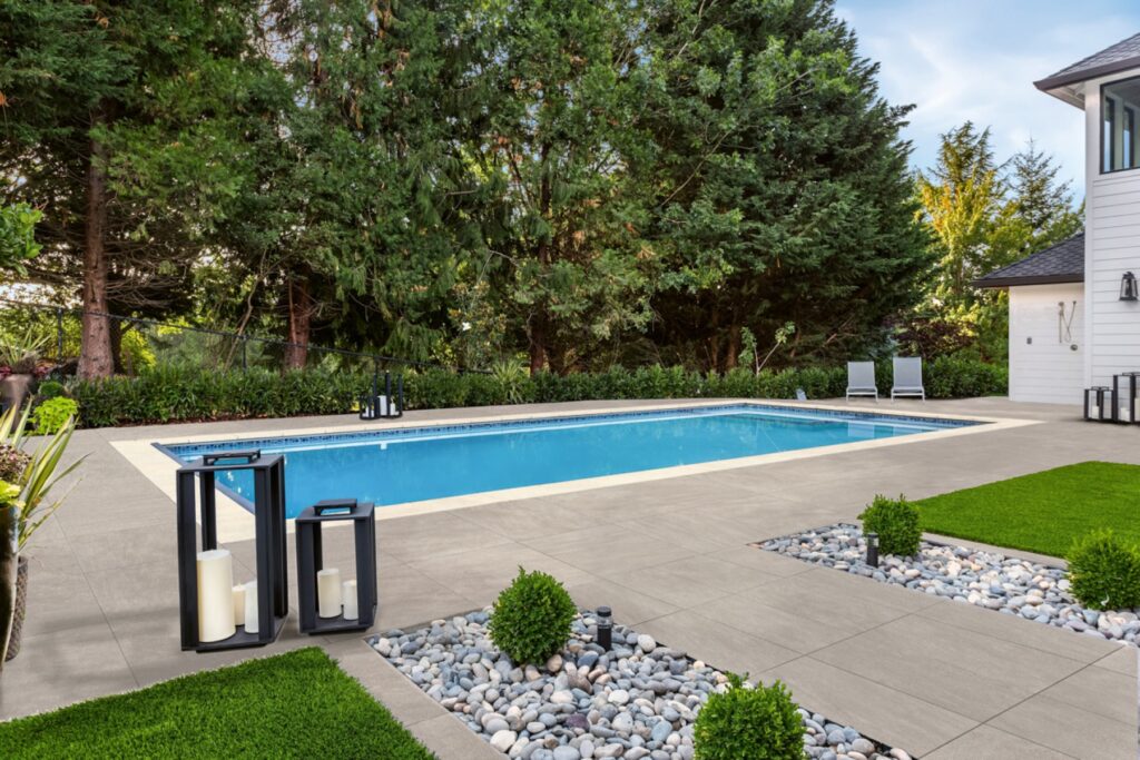 Slip-resistant porcelain pavers around a swimming pool deck